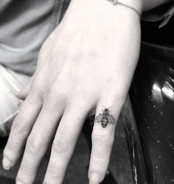 Emilia Clarke tiny finger Bumblebee Tattoo