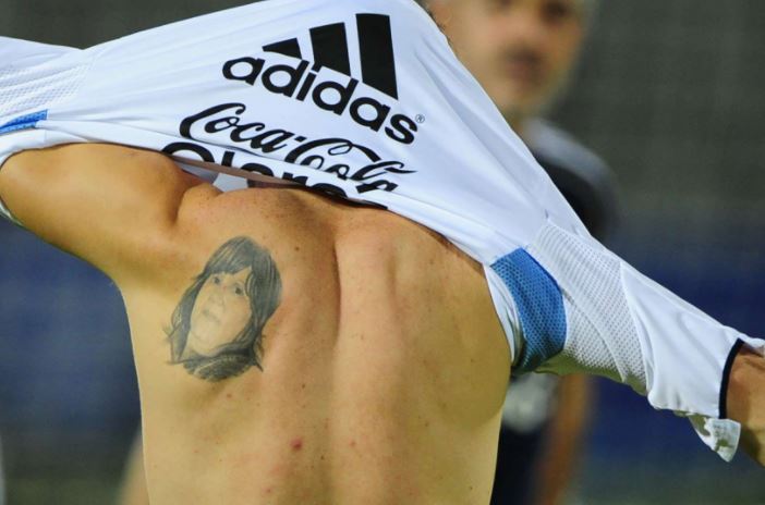 Lionel Messi first and back tattoo