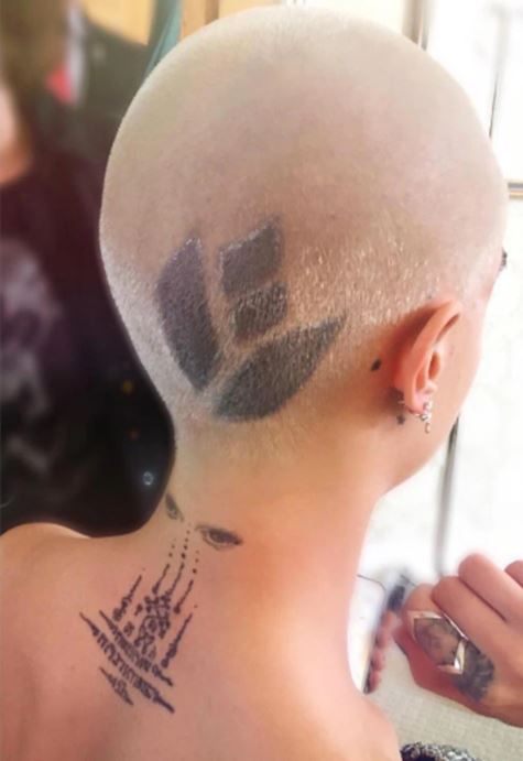 Cara Delevingne Head, Neck and Back Tattoos