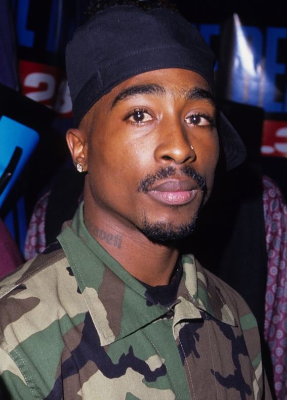 Tupac's Makaveli tattoo neck